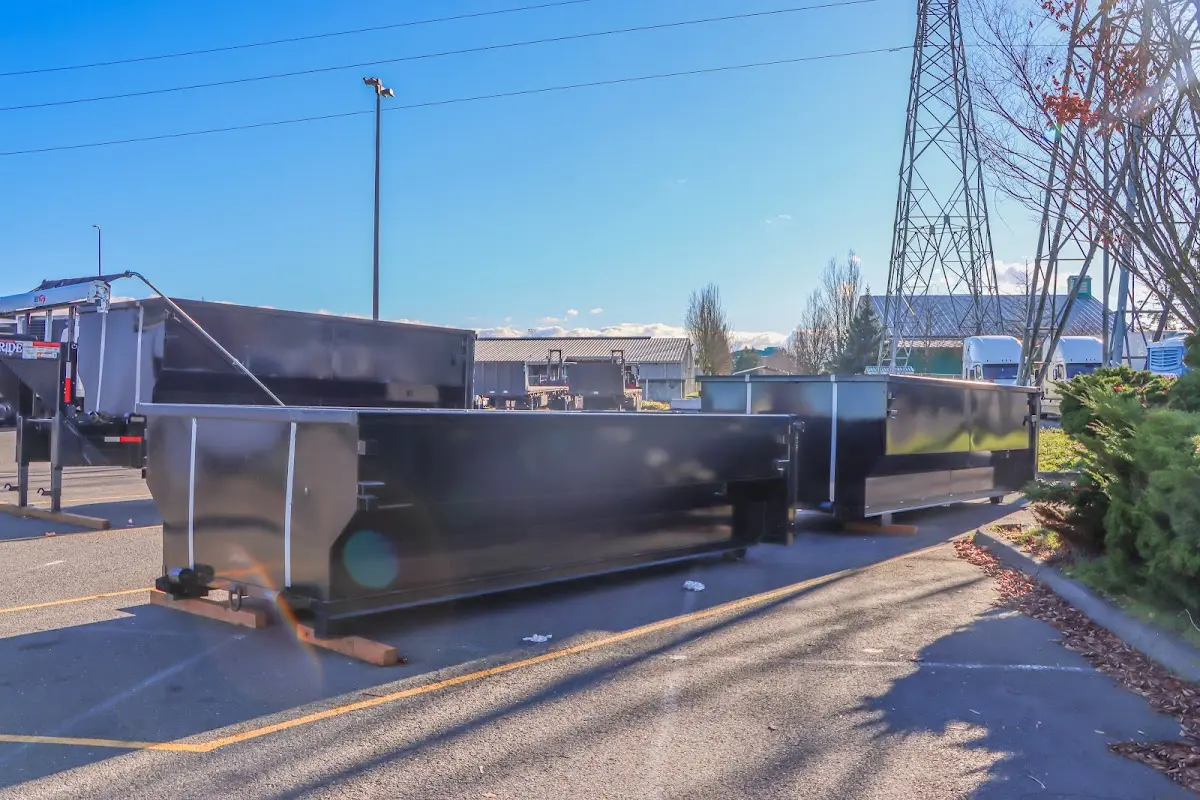 Roll-off dumpster ready for waste disposal at job site for Demolition Dumpster Rental in Georgetown